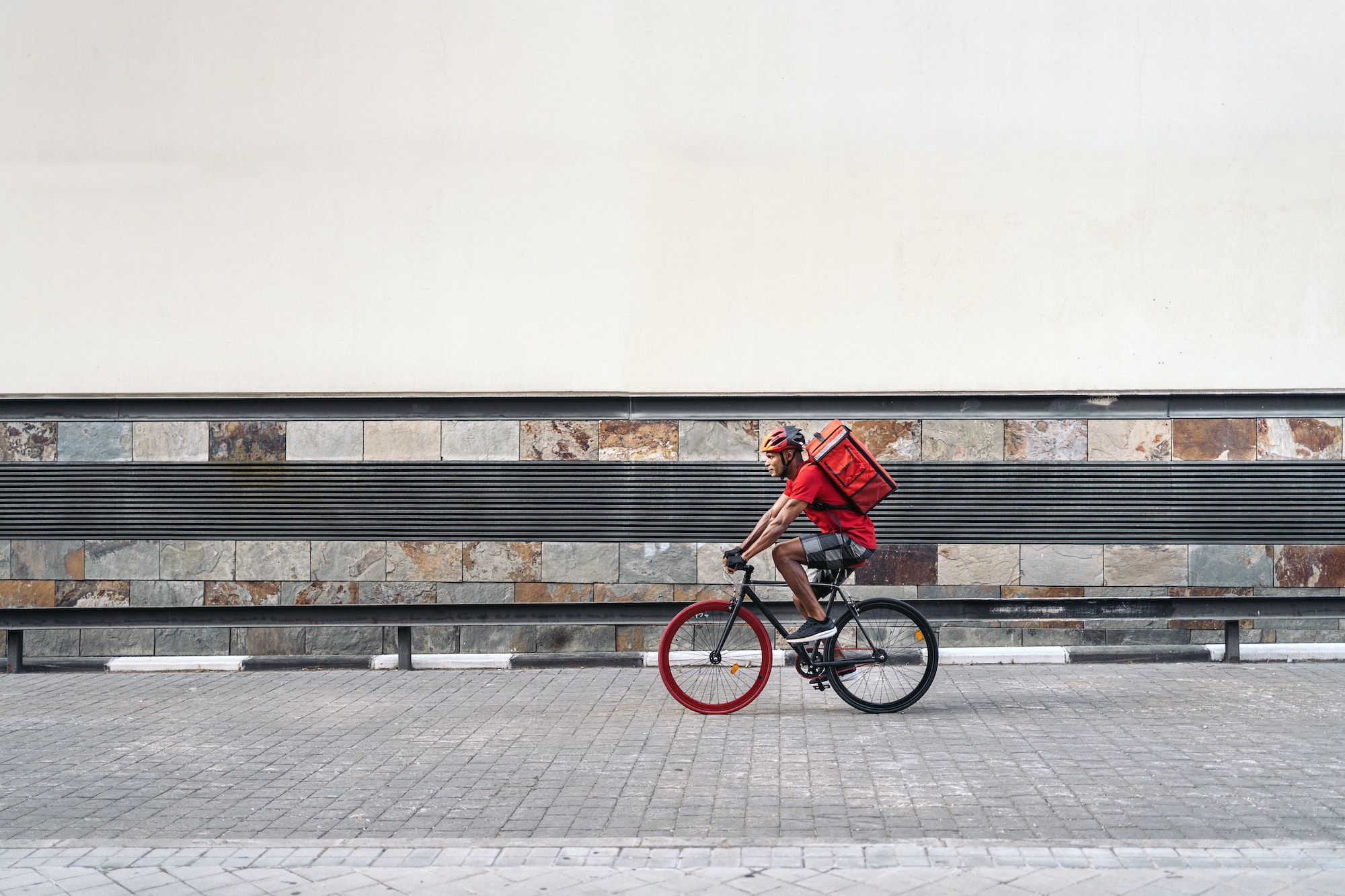 Delivery Man Riding Bike