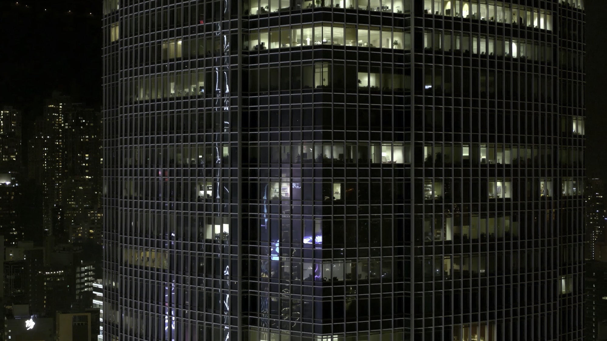 Unique Aerial flight around and approach to windows. Evening illumination. Offices from outside